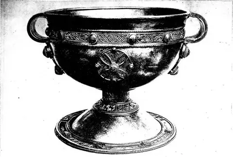 MINISTERIAL CHALICE OF ARDAGH of silver, gold filigree and enamels (the most probable dating is 9th-10th cent.), discovered in 1868 near the ruins of the monastery of S. Molua - Dublin, National Museum.