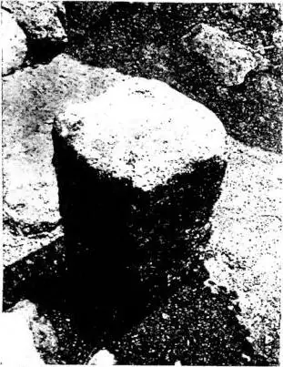 Above left: ALTAR STONE. Above right: FIGURE OF VEILED ASTARTE. Below: SKELETON OF A YOUTH IN AN AMPHORA.