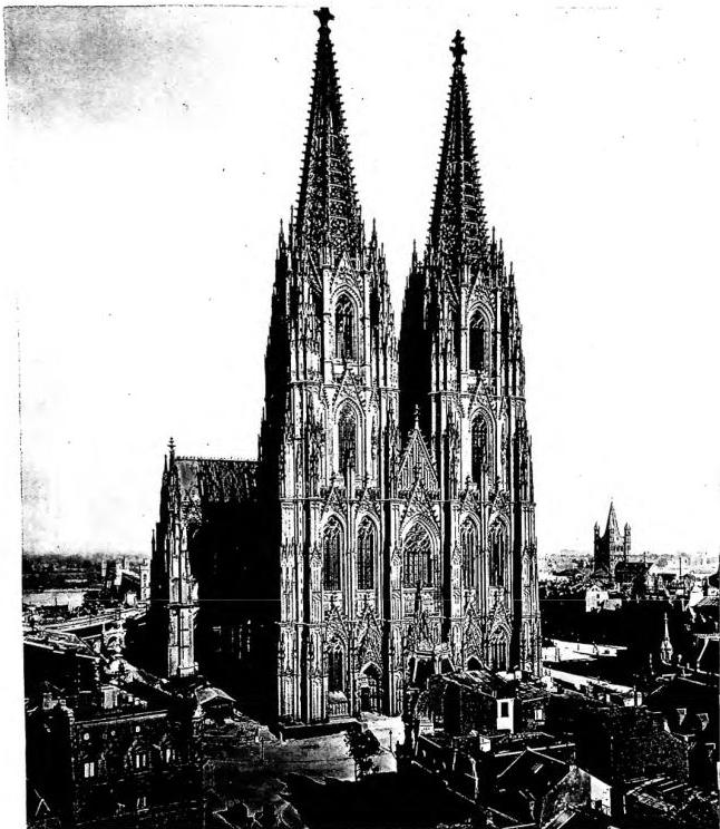Right: bell tower of St. Martin (12th-13th cent.).