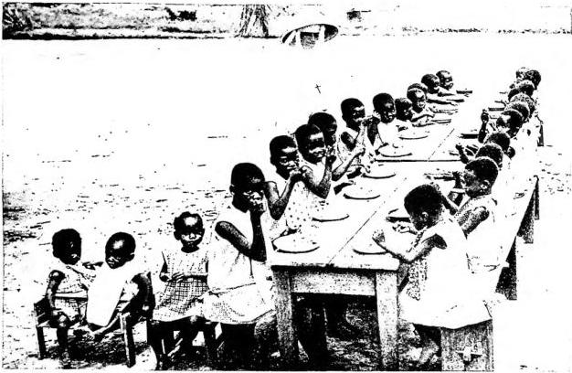 Above: FEEDING OF BLACK CHILDREN, assisted by the Sisters of St. Augustine - Apostolic Vicariate of Lisala.