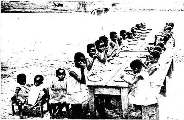 Above: FEEDING OF BLACK CHILDREN, assisted by the Sisters of St. Augustine - Apostolic Vicariate of Lisala. Below: CHAPEL OF THE YAMBUKU MISSION in the apostolic vicariate of Lisala.