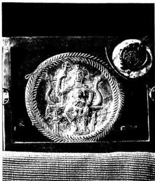 Above left: CHASED SILVER RELIQUARY (5th cent.) - Grado, Cathedral. Above right: SILVER PLATE found at Canoscio (Città di Castello) with inscription in honor of the martyr Agapitus (5th cent.). Below left: CROSS IN SOLID GOLD WITH GEMS AND FILIGREE (7th cent.) from the Sancta Sanctorum (rear side) - Vatican Library, Museo Sacro. Below right: SILVER SHRINE OFFERED BY POPE GREGORY IV (827-44) for reliquary of the head of St. Sebastian - Rome, Vatican Library, Museo Sacro.