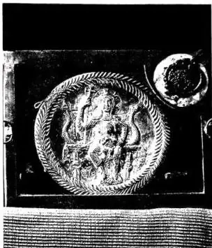 Above left: CHASED SILVER RELIQUARY (5th cent.) - Grado, Cathedral. Above right: SILVER PLATE found at Canoscio (Città di Castello) with inscription in honor of the martyr Agapitus (5th cent.). Below left: CROSS IN SOLID GOLD WITH GEMS AND FILIGREE (7th cent.) from the Sancta Sanctorum (rear side) -