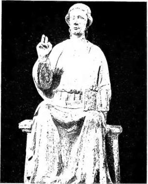 Above left: CHRIST BLESSING. Wooden statue attributed to Ramo di Paganello (late 13th cent.) or to Lorenzo Maitani (14th cent.) - Orvieto, Museo dell'Opera del Duomo. Above right: THE VIRGIN ENTHRONED. Detail of the monument to Card. Guillaume de Braye. Work by Arnolfo di Cambio (late 13th cent.) - Orvieto, church of St. Dominic. Below left: CHOIR STALLS in carved wood (1414-31) - Orvieto, Cathedral. Below right: MARBLE HOLY WATER STOUP by Antonio Federighi (1485) - Orvieto, Cathedral.