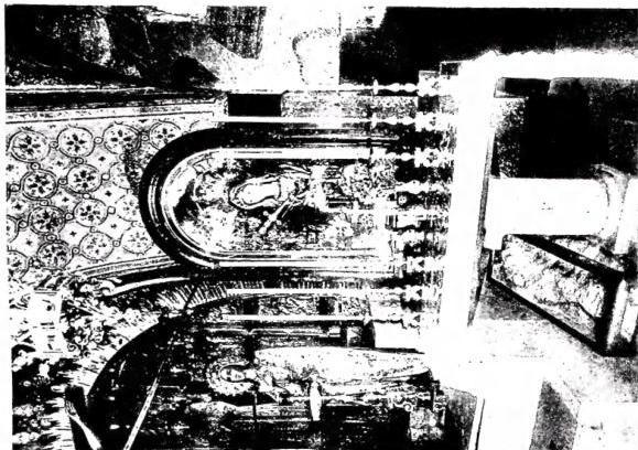 Left: SOUTHERN PART of the medieval ambulatory of the basilica of the Holy Sepulchre. On the left, chapel of the division of the garments; on the right, chapel of the "reproaches" - Jerusalem. Right: THE CALVARY, altar of the Latins. Under the altar can be seen the natural rock protected by glass - Jerusalem, basilica of the Holy Sepulchre.