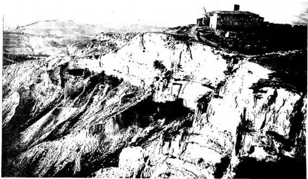 Above: VIEW OF THE BALZE. Above the abbey of SS. Salvatore, Giusto and Clemente, founded in the 11th cent., now abandoned - Volterra. Below left: THE ETRUSCAN ARCH. Rebuilt by the Romans, it preserves from the Etruscan era the jambs and the three heads - Volterra. Below right: PALAZZO DEI PRIORI (12
