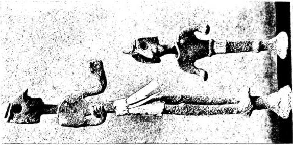 Left: STELE depicting the God Ba'al with the thunderbolt (20th-19th cent. B.C.). Centre: IVORY RELIEF from Minat al-Bajdā', showing a female deity (14th cent. B.C.). Right: STATUETTE of a deity in silver with gold necklaces and skirt (20th-19th cent. B.C.).